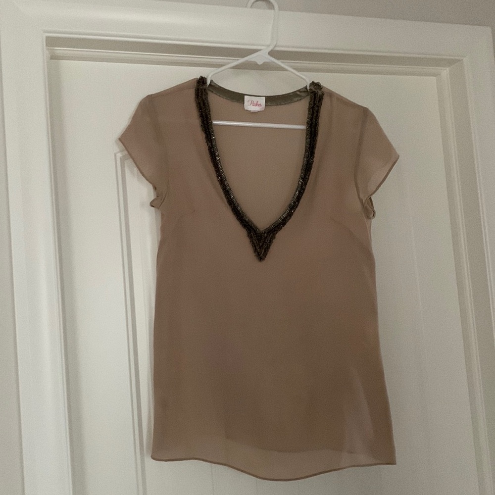 Parker sequins top. Deeper V shape blouse.